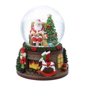 Fireside Santa Snow Globe